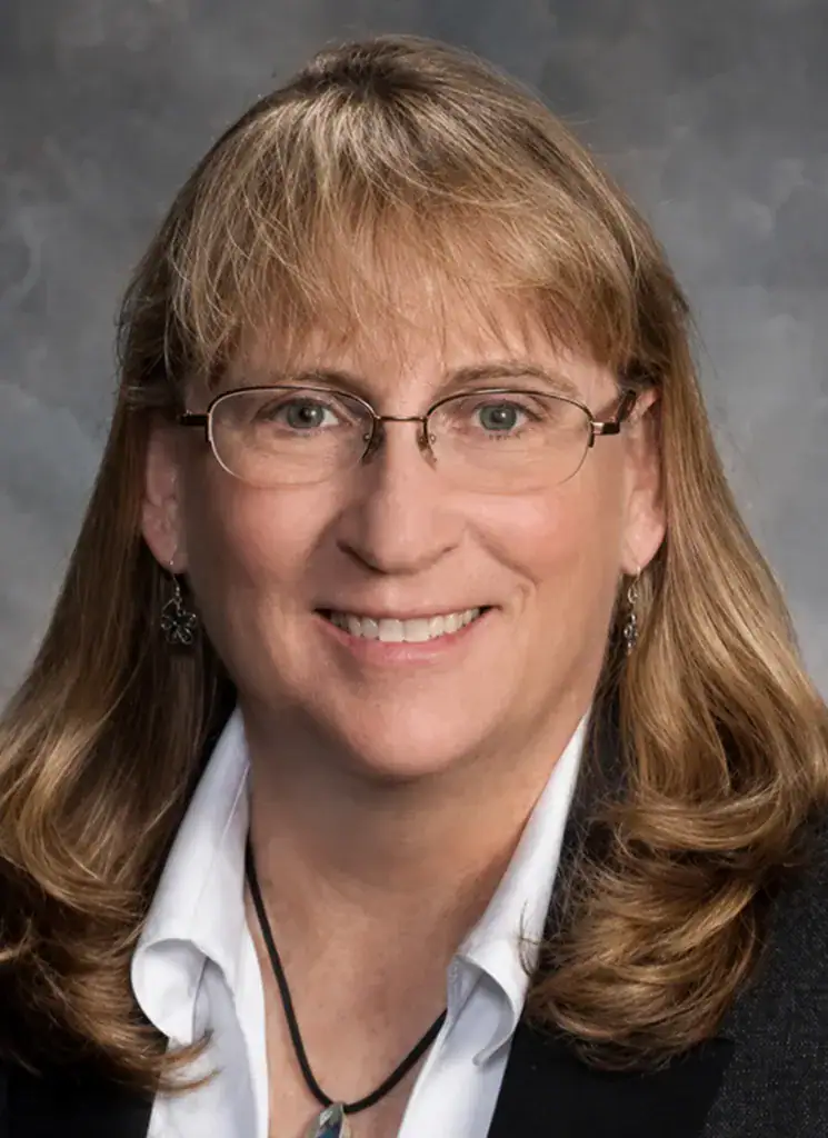 Kimberley Owens smiling in professional headshot for vcfo.