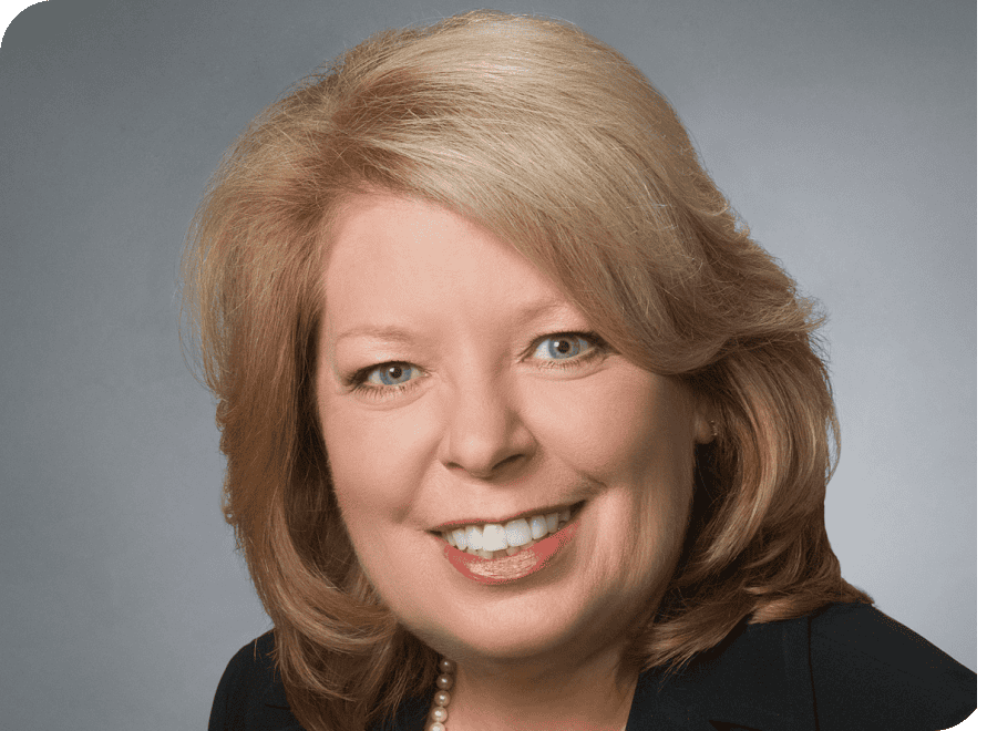 Professional headshot of Sharon Gill, VCFO executive.