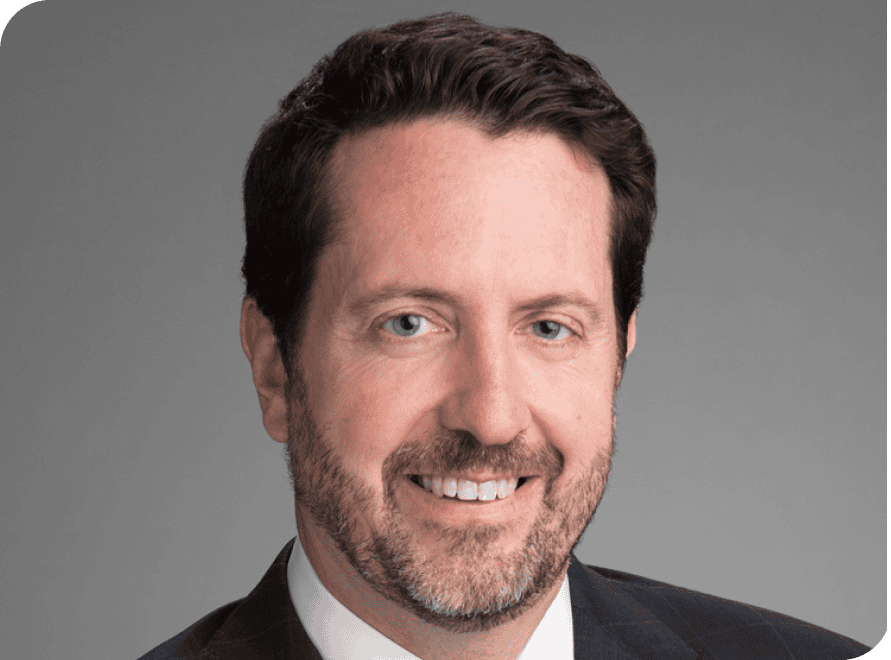 Professional VCFO executive Chris Hysinger smiling in a business portrait.