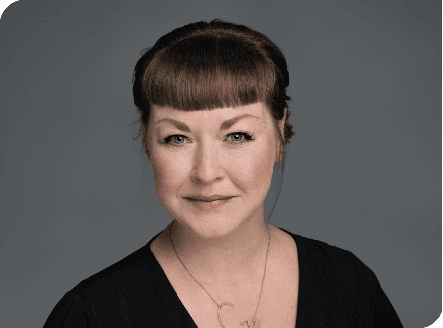 Courtney Plunkett, professional at vcfo, smiling in a business portrait.