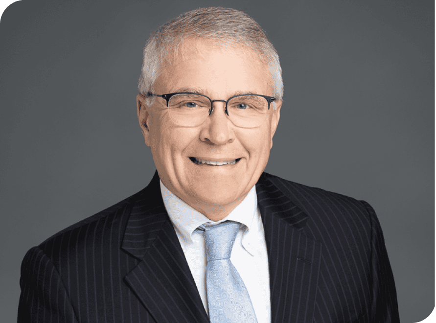 VCFO professional Elbert Johnson smiling in a business portrait.