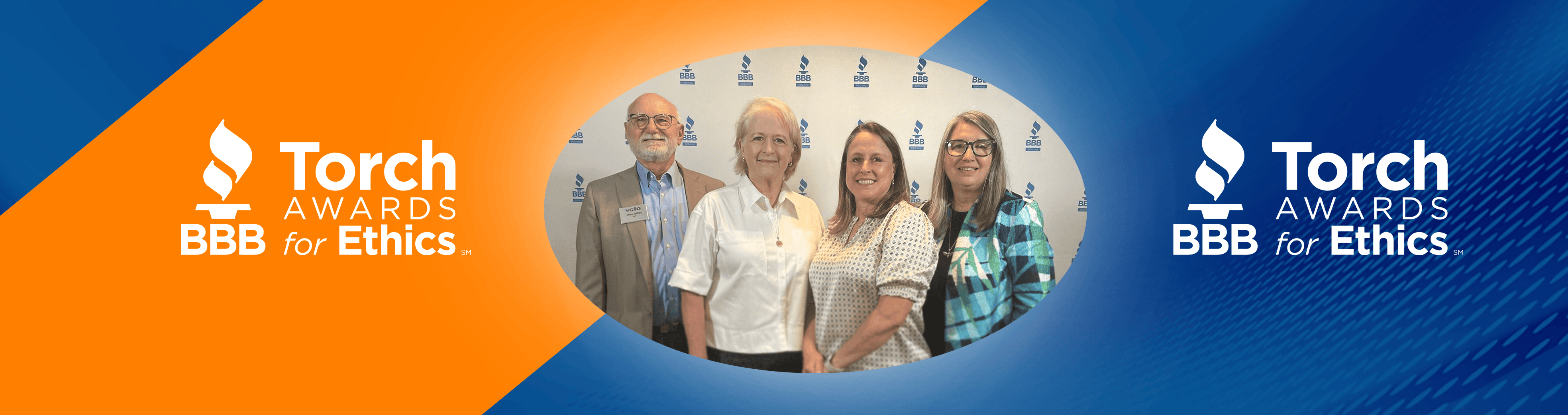 Group of professionals at Torch Awards for Ethics event 2023.