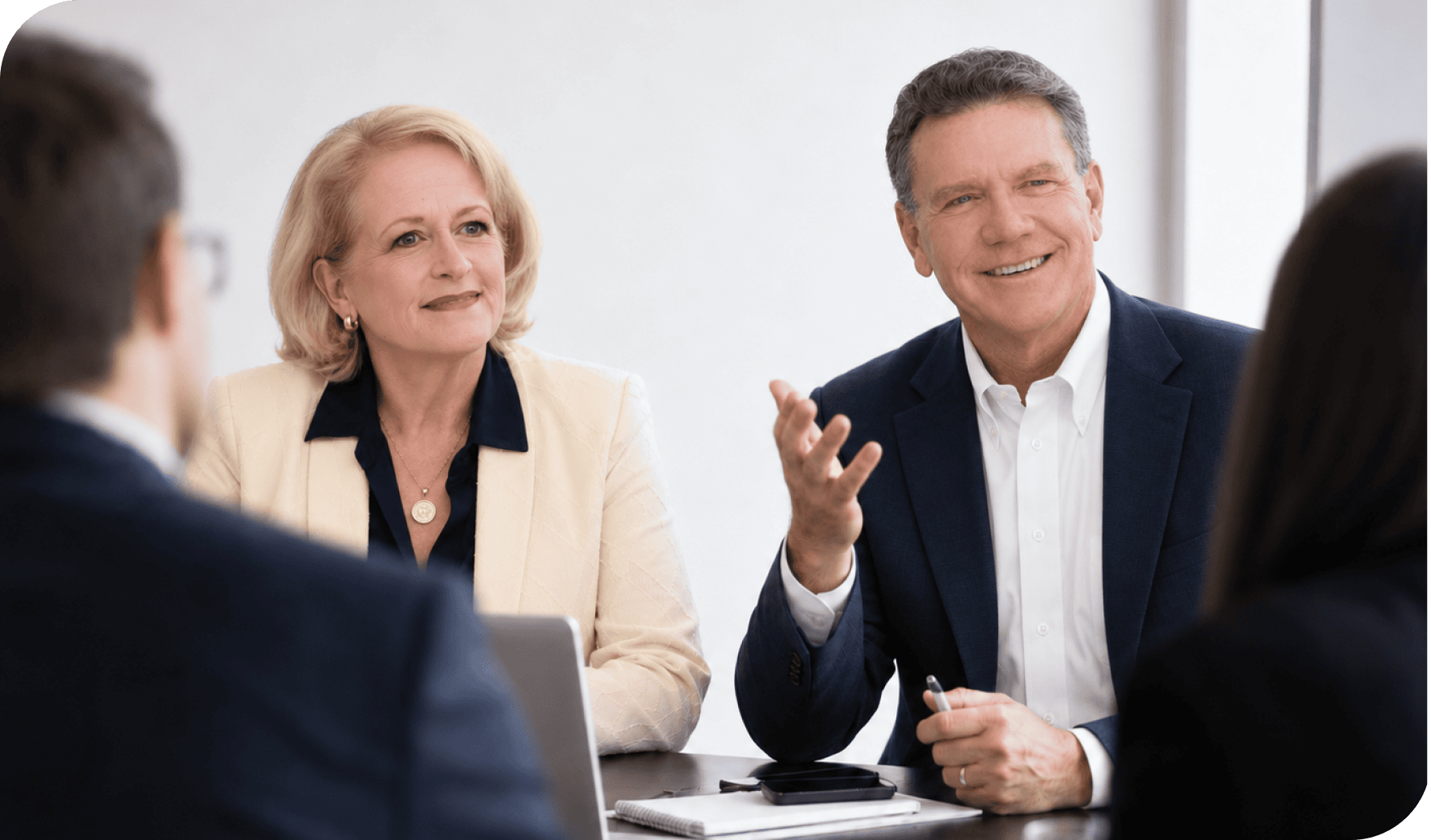 Business professionals in a meeting discussing strategies and growth.