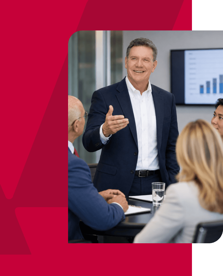 Business meeting with a speaker presenting financial data to a group.