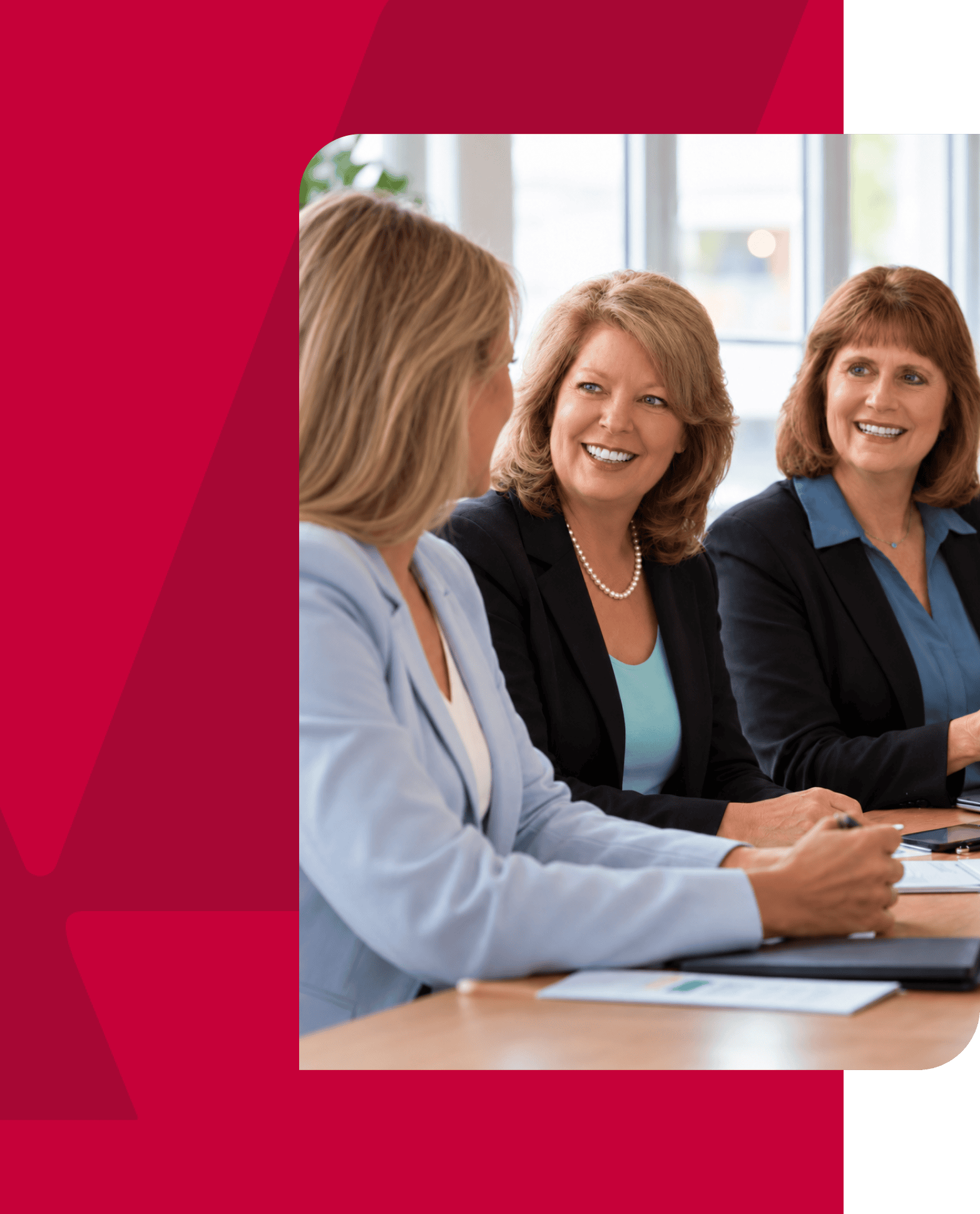 Business women in a meeting discussing finance and accounting strategies.