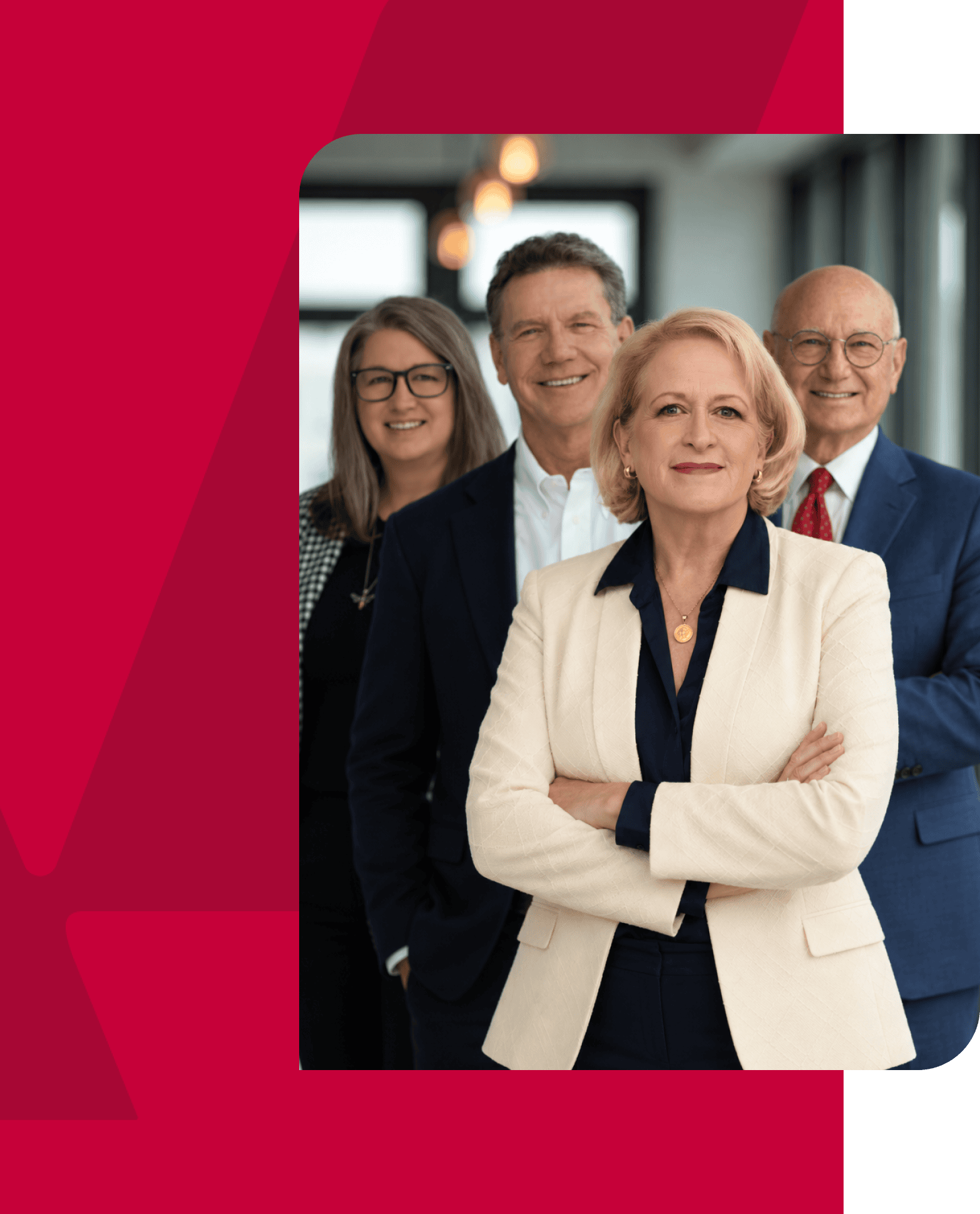 Professional business team of diverse professionals in a modern office setting.